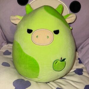 Green apple cow squishmallow with mischievous eyes NWT